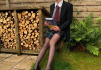 Girl with logs for wood burner